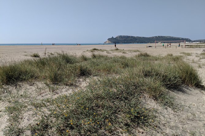 Cagliari E-Bike Tour: Gulf, Canals & Flamingos at Molentargius - Calamosca Beach and the climb to the lighthouse