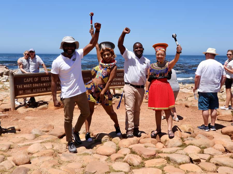 Cape Town: Cape of Good Hope & Penguins Day Tour with Pickup - Muizenberg brings a different kind of coast
