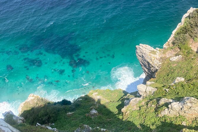 Cape Town: Peninsula, Cape of Good Hope and Penguins Tour - Camps Bay starts the coastal view