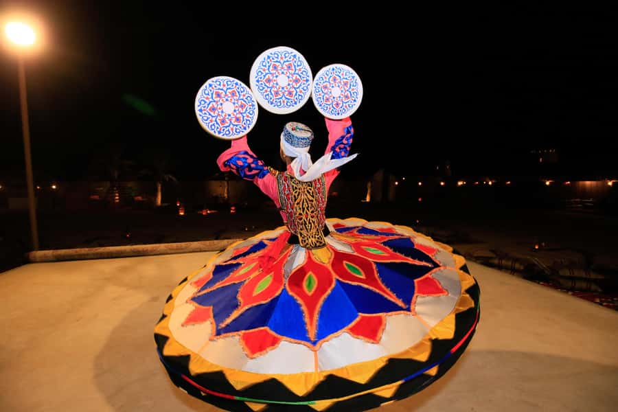 Dubai: Bedouin Camp, Dune Safari, Falcon Show & BBQ Dinner - Sandboarding and the sunset pause