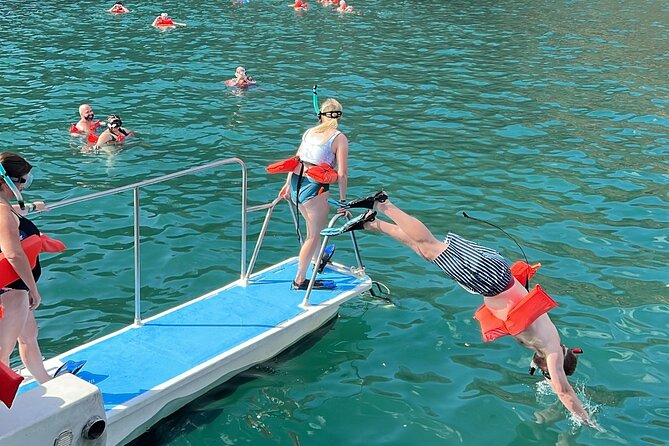 Flamingo Family Fun Catamaran Snorkel:Comfortable shaded seating - The sunset ride back to Flamingo
