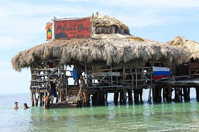 Floyd's Pelican Bar [Private Transportation] - A wooden bar in the middle of the sea