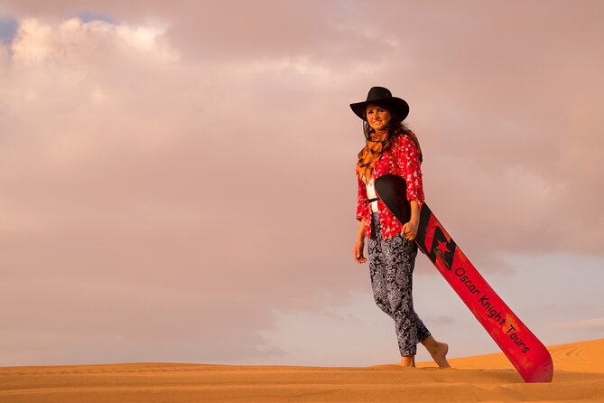 High Red Dunes with Camel Ride, Sandboarding, Falcon Show and VIP BBQ Dinner - Falconry, henna, and the camp program