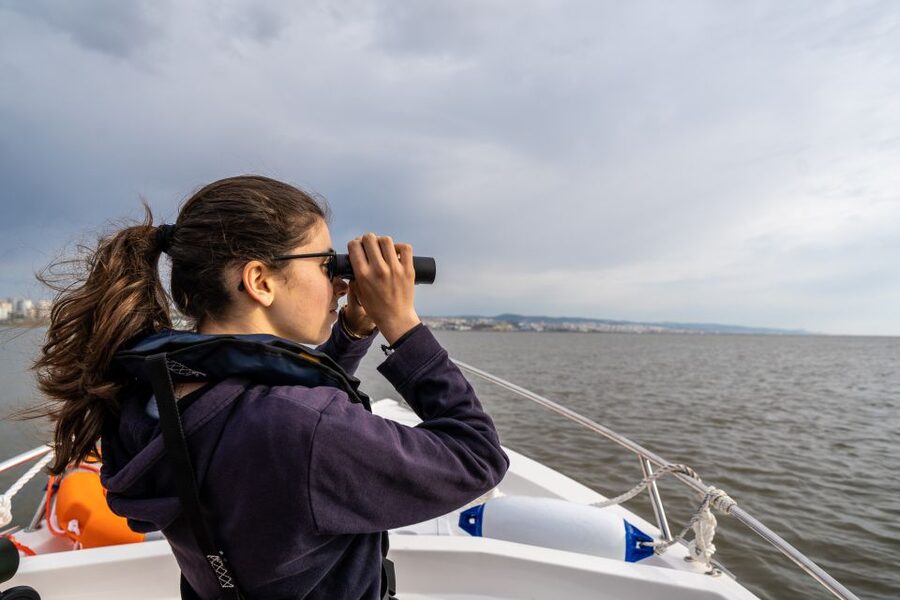 Lisbon: Tagus Estuary Nature Reserve Birdwatching Boat Tour - Returning beneath the Vasco da Gama Bridge