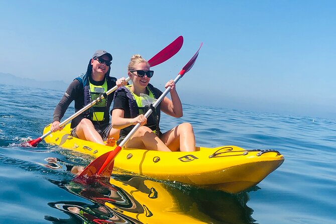 Paddle with the Penguins - Setting out from Seaforth Beach in Simon’s Town