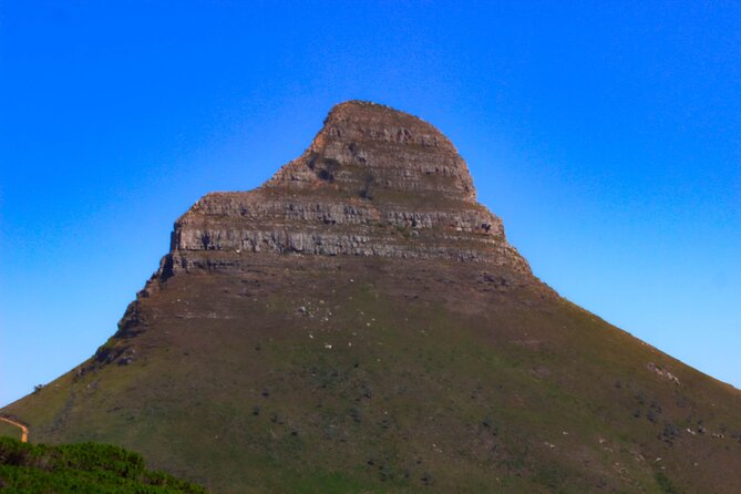 Table Mountain and Cape Peninsula Tour with Penguins - Muizenberg brings the day back to False Bay